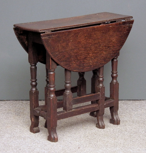 A 17th Century oak circular gateleg