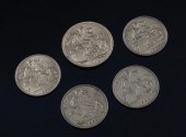A 1908 gold sovereign and four