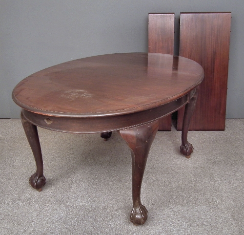 A 1920s mahogany oval extending