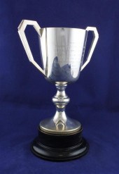A 1930's Art Deco silver two h