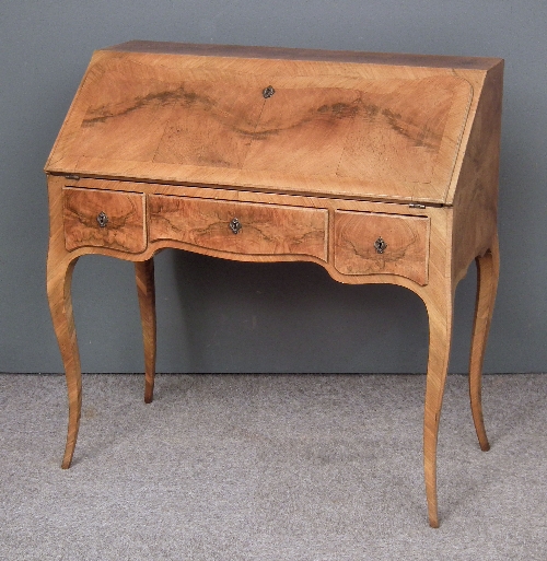 A 1930s lady's walnut bureau the