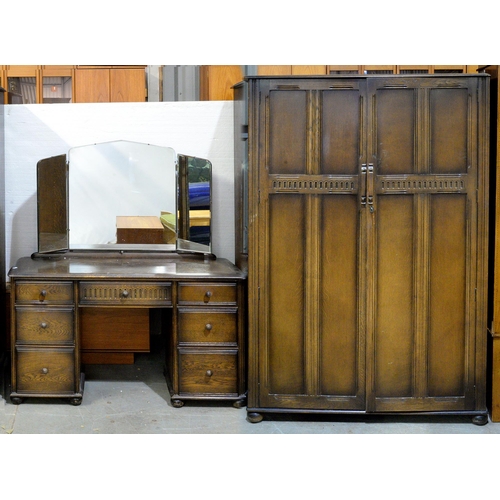 A 1930s three piece oak bedroom