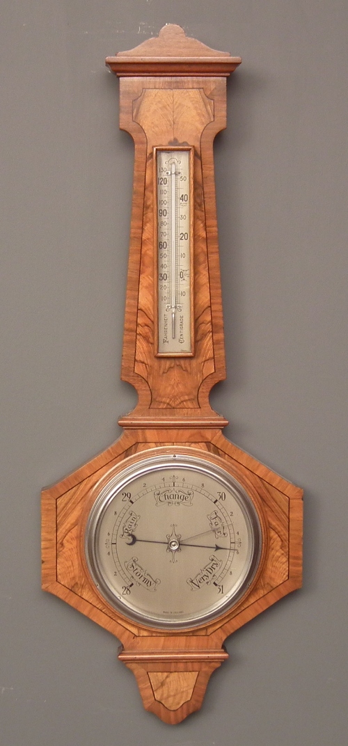 A 1930s walnut cased aneroid