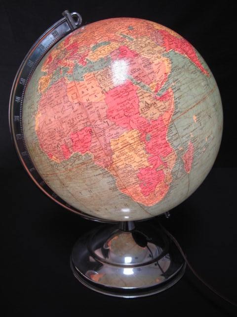 A 1940's globe on chrome stand with
