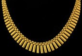 A 1960s 18ct gold fringe patte