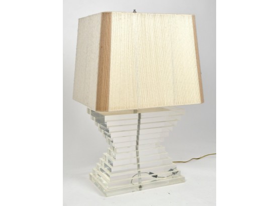 A 1970s lucite table lamp