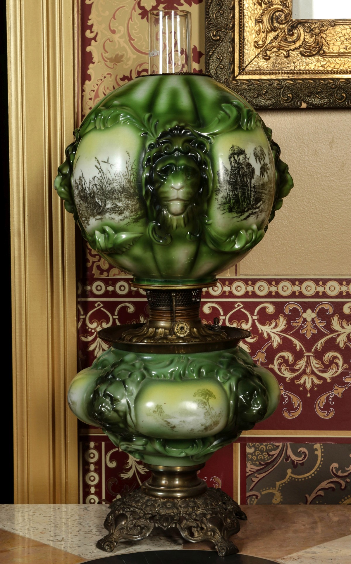 A 19C. PARLOR LAMP WITH LIONS