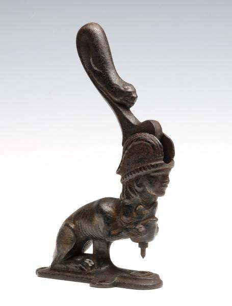 A 19TH C. CAST IRON SPHINX