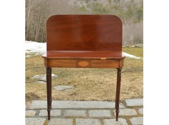 A 19th C. Federal mahogany flip-top