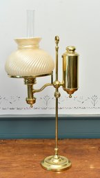 A 19th C. oil burning, adjustable
