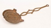 A 19th Century brass chestnut