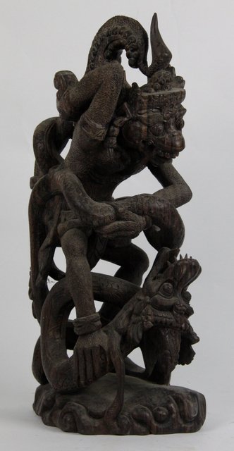 A 19th Century carved hardwood