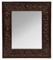 A 19th Century carved oak mirr