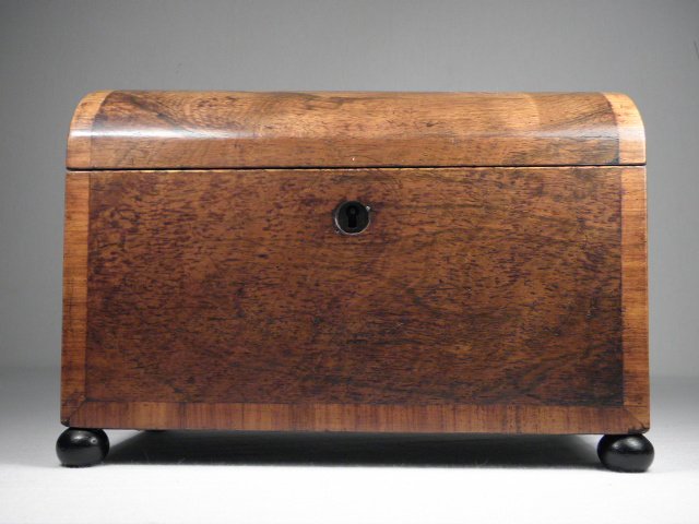 A 19th century tea caddy with a