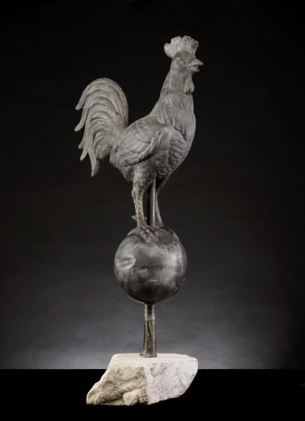 A 19TH CENTURY ZINC ROOSTER ON