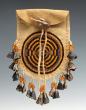 A 20TH C. BEADED CARIBOU HIDE