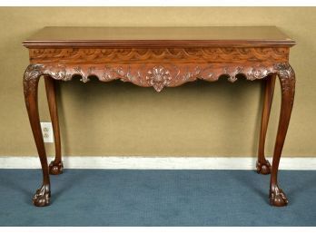 A 20th C. carved mahogany