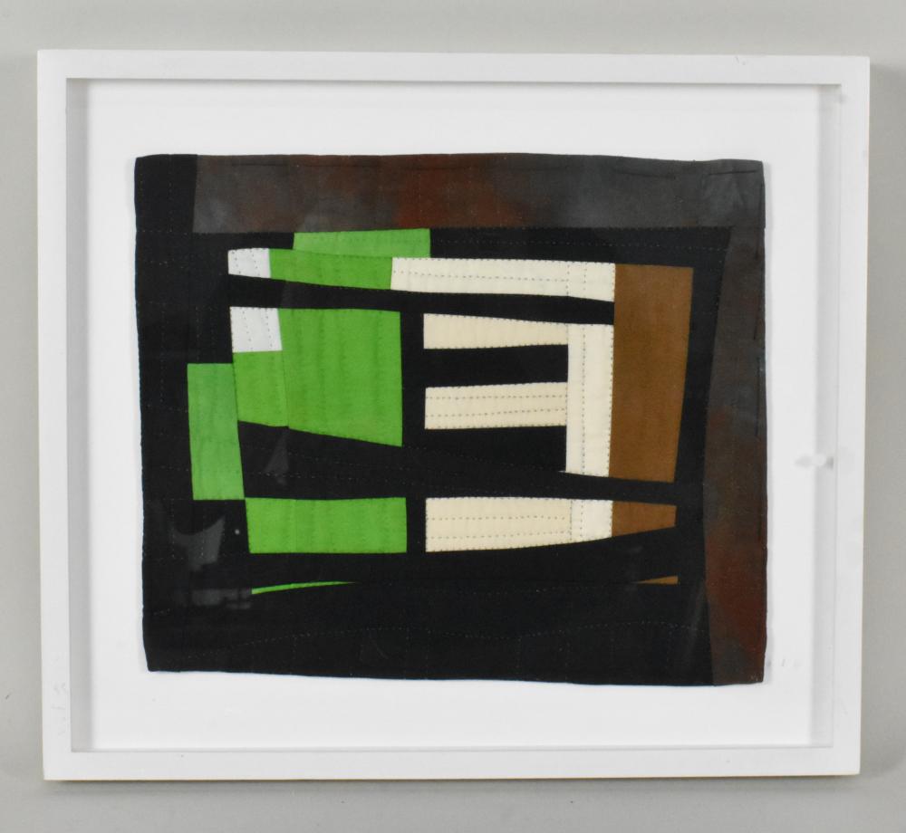 A 20TH CENTURY FRAMED QUILTED