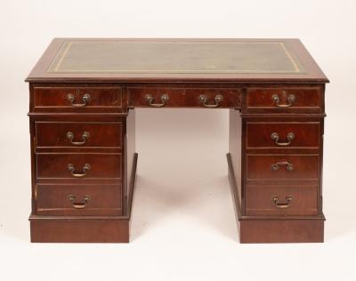 A 20th Century mahogany pedestal