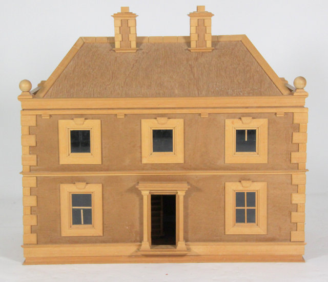 A 20th Century pine doll's house on