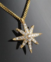 A 22ct gold and diamond starbu