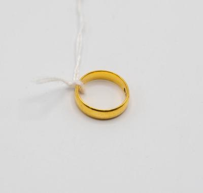 A 22ct yellow gold wedding band,