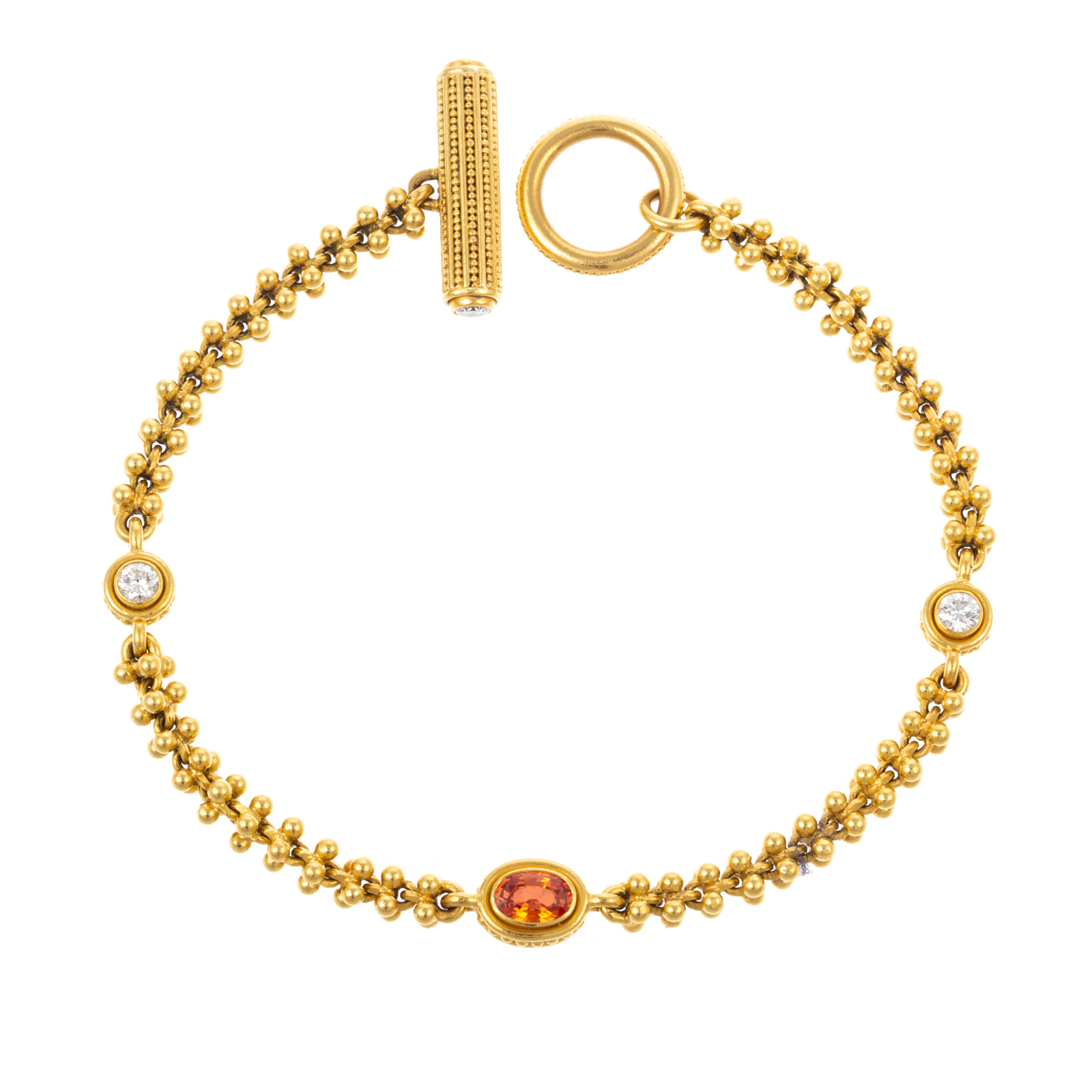A 22K ORANGE SAPPHIRE & DIAMOND