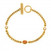 A 22K ORANGE SAPPHIRE & DIAMON
