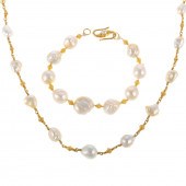 A 22K PEARL NECKLACE & 20K BRA
