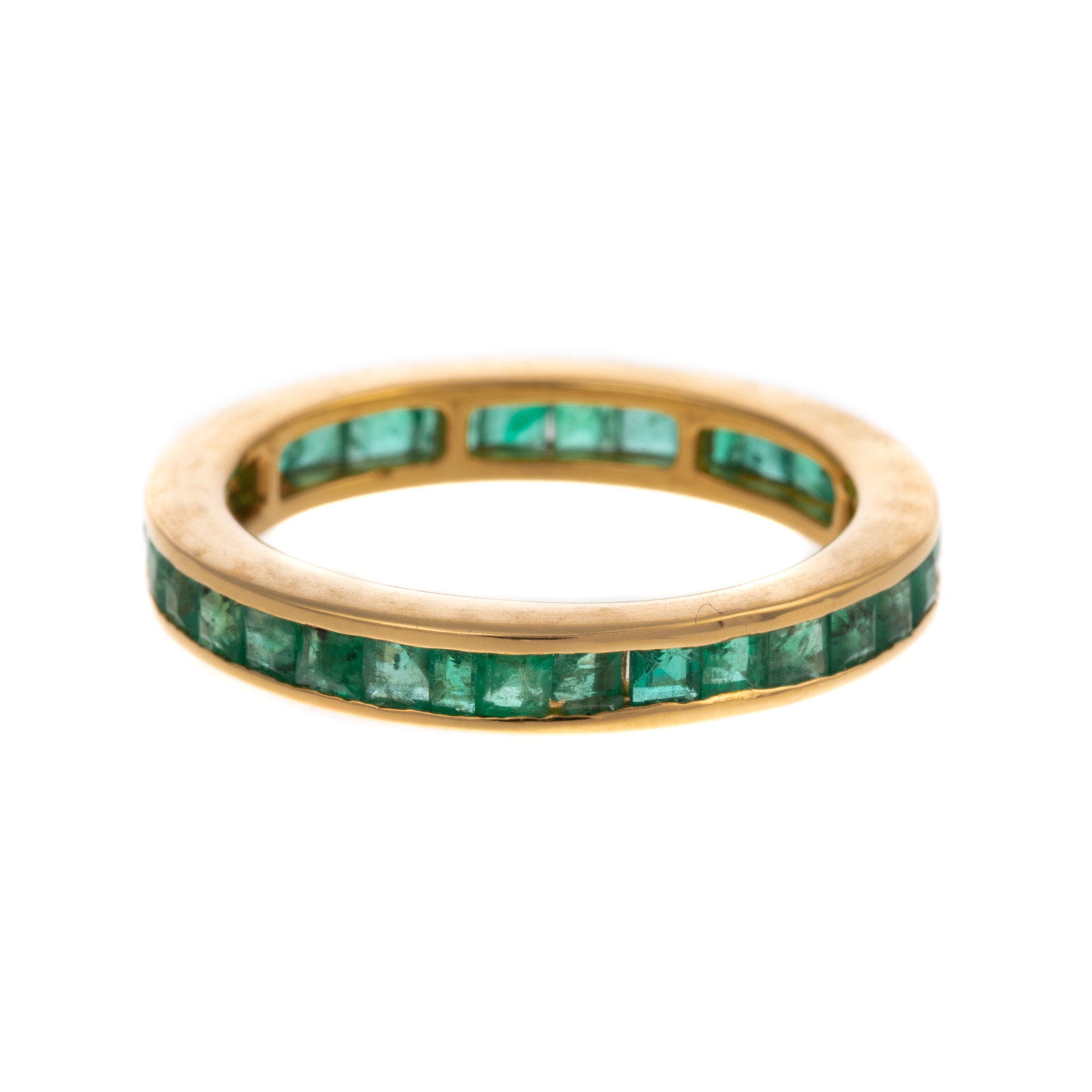 A 2.50 CTW EMERALD ETERNITY BAND IN