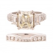 A 3.77 CT DIAMOND RING & BAND