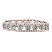A 6.00 CTW DIAMOND & EMERALD B