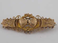 A 9 carat gold bar brooch circa