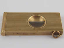 A 9 carat gold cigar cutter by A.
