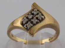 A 9 carat gold diamond cluster