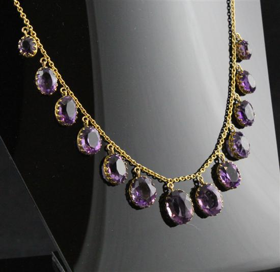 A 9ct gold and amethyst fringe