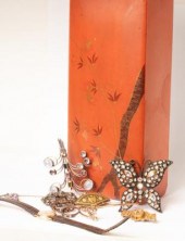 A 9ct gold bangle with gem set