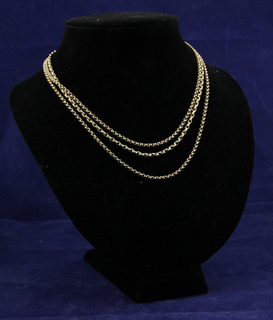 A 9ct gold three-strand necklace