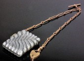 A 9ct rose gold 335mm double A