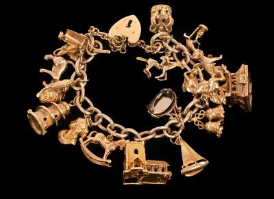 A 9ct yellow gold charm bracelet,