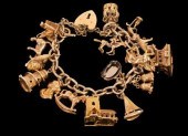 A 9ct yellow gold charm bracel