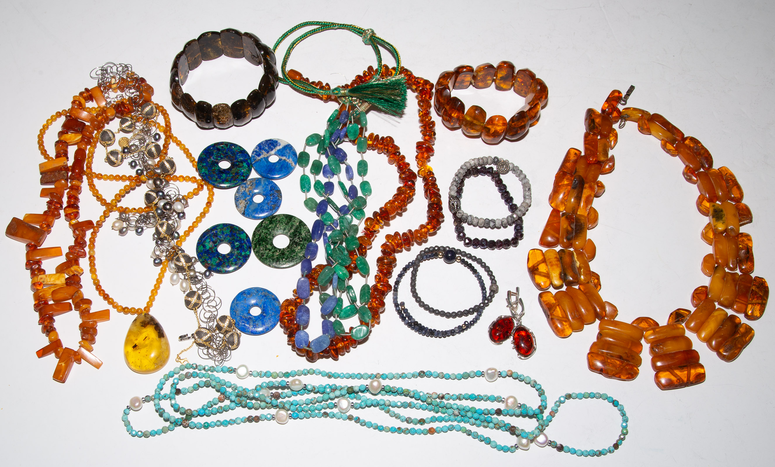 A BAG OF AMBER, PEARL & GEMSTONE