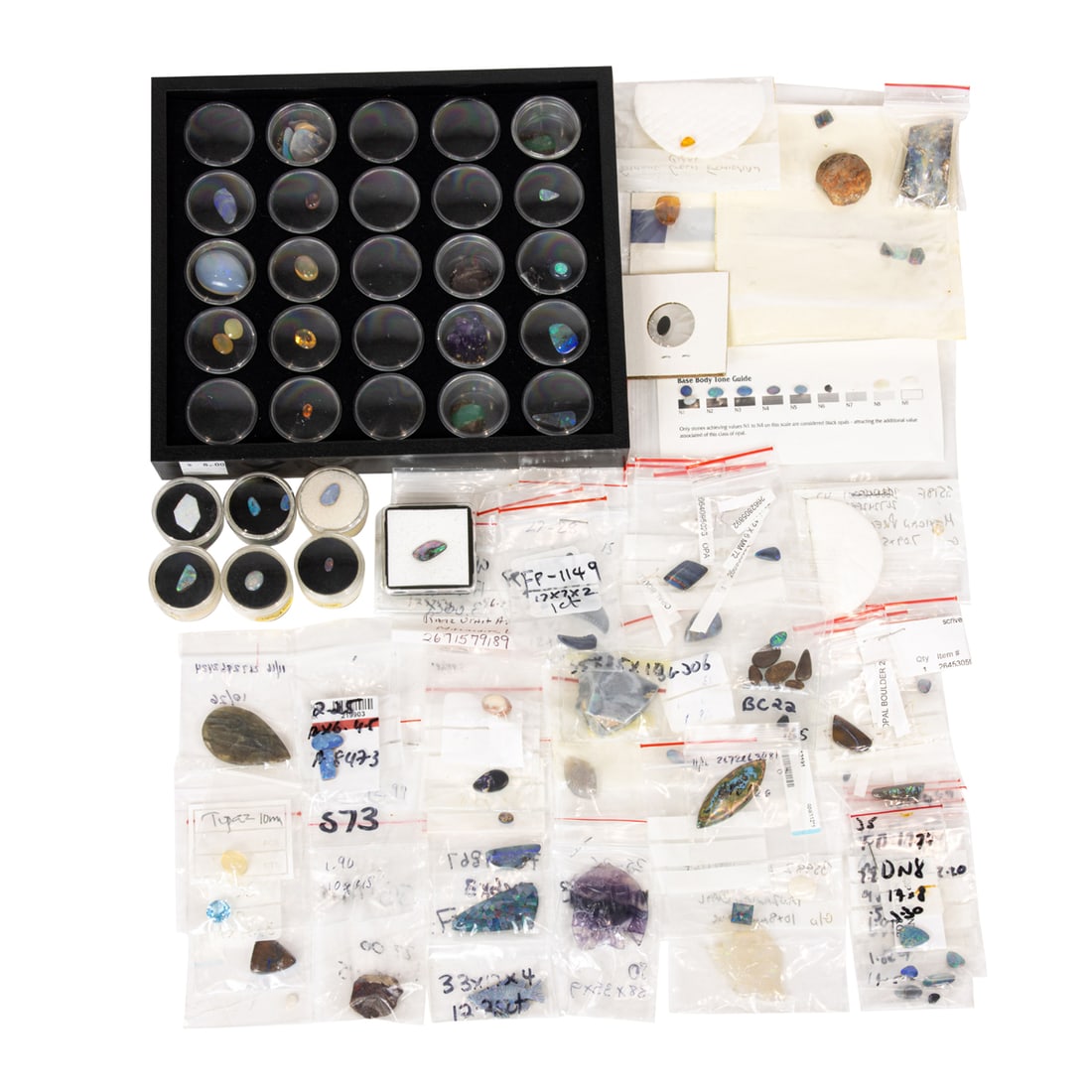A BAG OF ASSORTED GEMSTONESA bag of