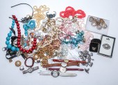 A BAG OF BEADED NECKLACES & GO
