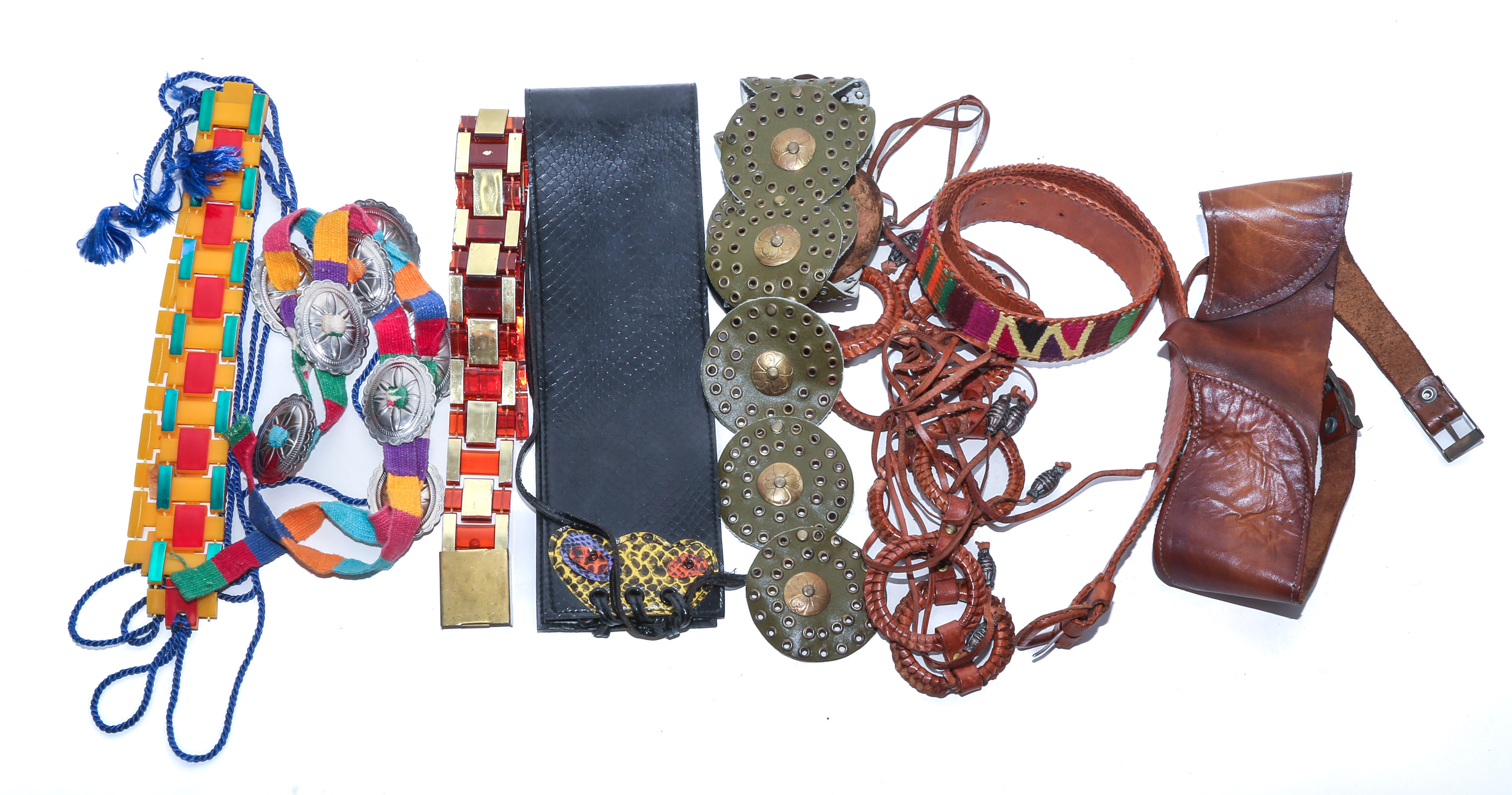 A BAG OF VINTAGE BELTS .