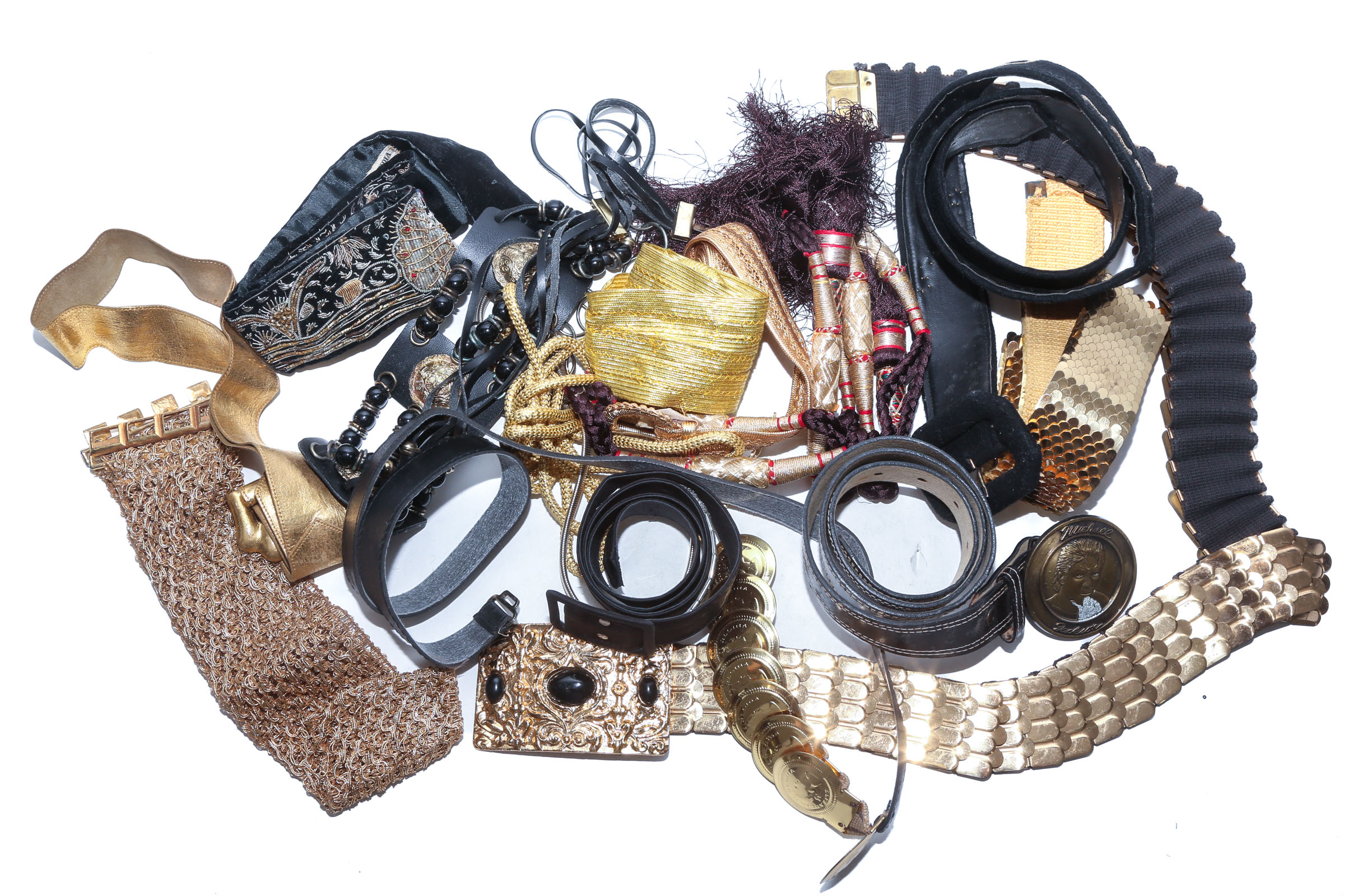 A BAG OF VINTAGE BELTS Including