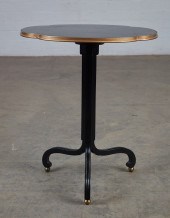 A BAKER EBONIZED AND GILT HEIG