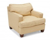 A BAKER UPHOLSTERED ARMCHAIRA