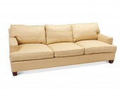 A BAKER UPHOLSTERED THREE-SEAT
