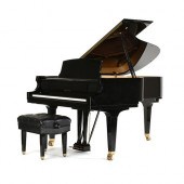 A BALDWIN POLISHED EBONY ARTIS